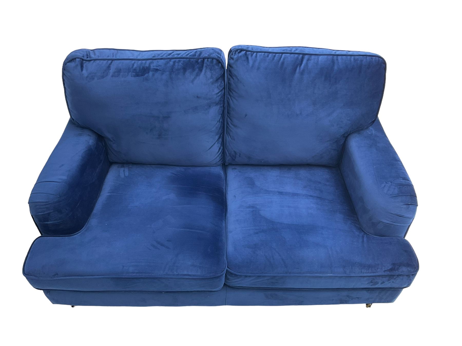 Howard design - two-seat sofa upholstered in blue fabric, traditional shape with rolled arms, on walnut finish turned feet with brushed metal cups and castors