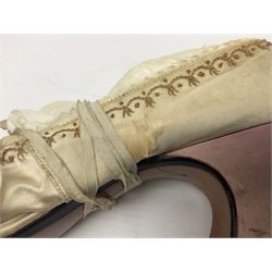 Pair of 19th century ivory silk satin ladies shoes, with rosette to the vamp, with pink silk satin heel, L23cm