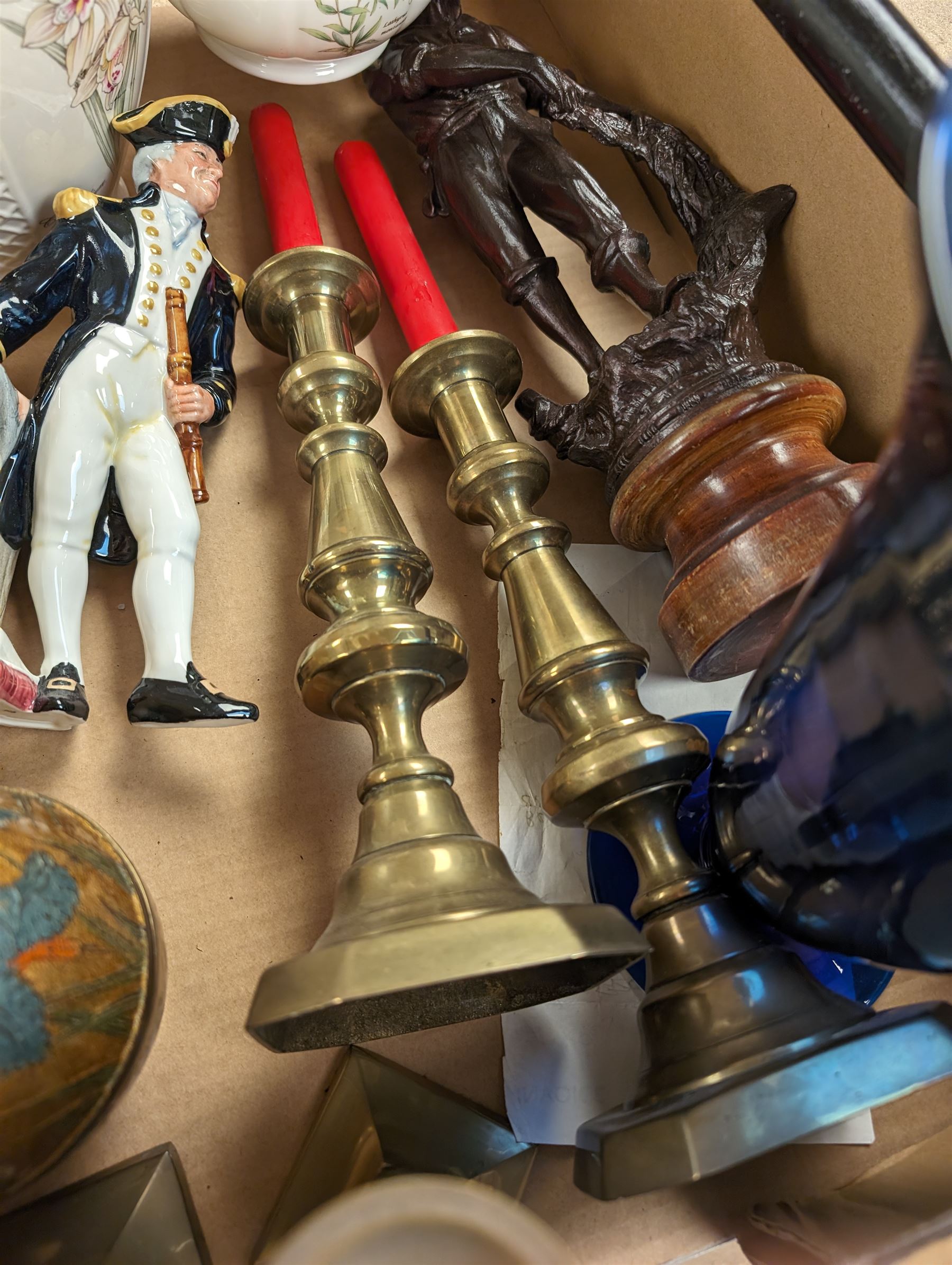 Two pairs of brass candlesticks, Royal Doulton Napoleon figure, composite figure of a fisherman and other collectables