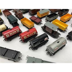 Hornby Dublo - forty-three goods wagons including nine tank wagons (Esso, Mobil, Vacuum, UD and Traffic Services), brake vans, meat and fish wagons, bogie well and bolsters, cable drums, open wagons, salt and grain wagons, etc; and six others by Tri-ang etc; all unboxed (49)