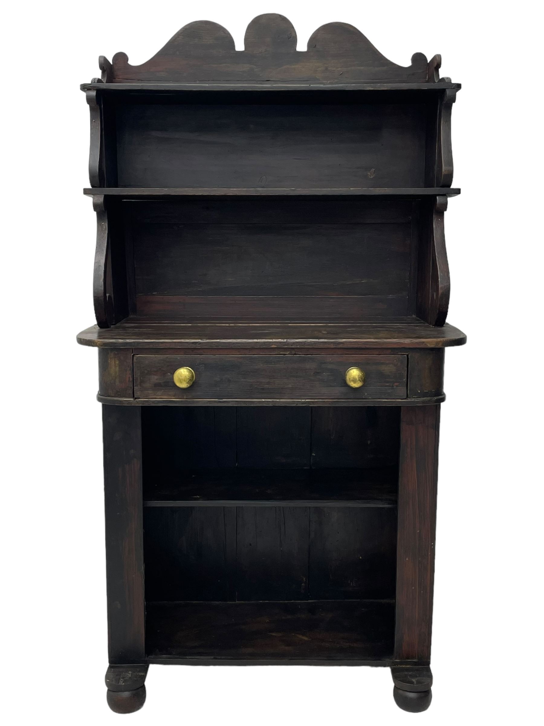 Victorian scumbled pine chiffonier, raised shaped back fitted with two shelves on S-scroll supports, rectangular top with rounded corners over single frieze drawer and open shelf, on projecting rounded sledge platforms and compressed bun feet, scumbled to resemble rosewood 