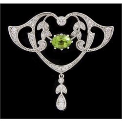 Silver milgrain set peridot and cubic zirconia openwork brooch