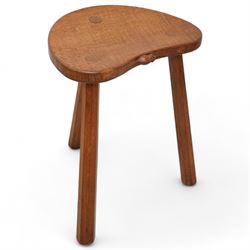 Mouseman - oak three-legged stool, dished kidney-shaped seat on three octagonal splayed su...