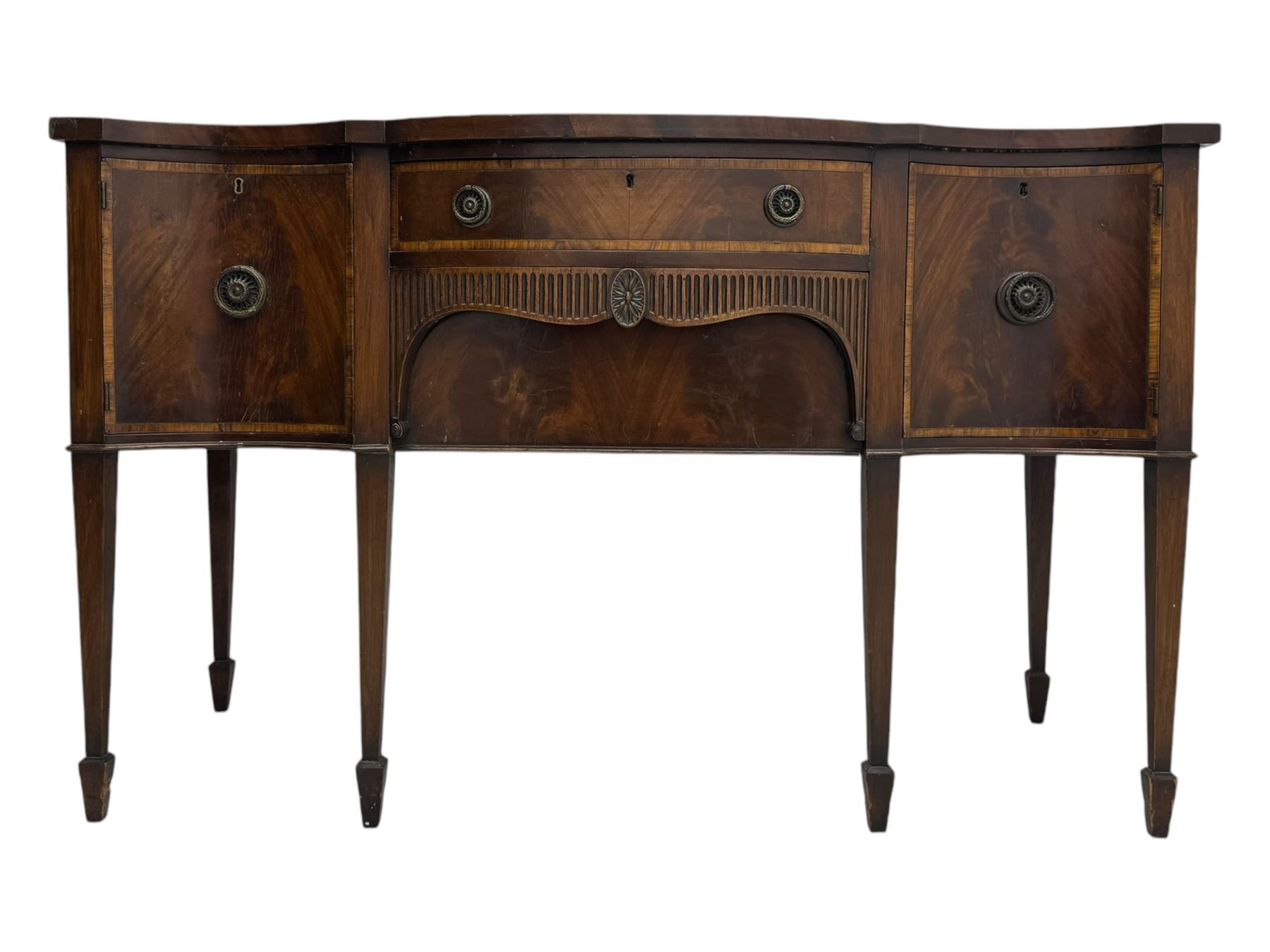 Early 19th century serpentine sideboard, fitted with two cupboards and two drawers, on square tapering supports with spade feet