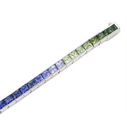 18ct white gold channel set multicoloured sapphire bracelet, sixty-one princess cut sapphires, various hues including blue, pink, green, yellow and teal, London 2004