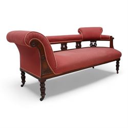 Late Victorian walnut chaise longue, upholstered in red fabric, scroll leaf and pierced sp...