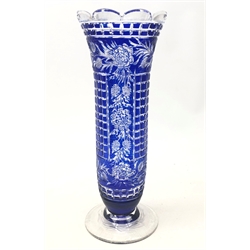  1930s John Walsh crystal blue overlay vase, flared trumpet form engraved with Roses amongst foliage and square cut panels, H36cm  