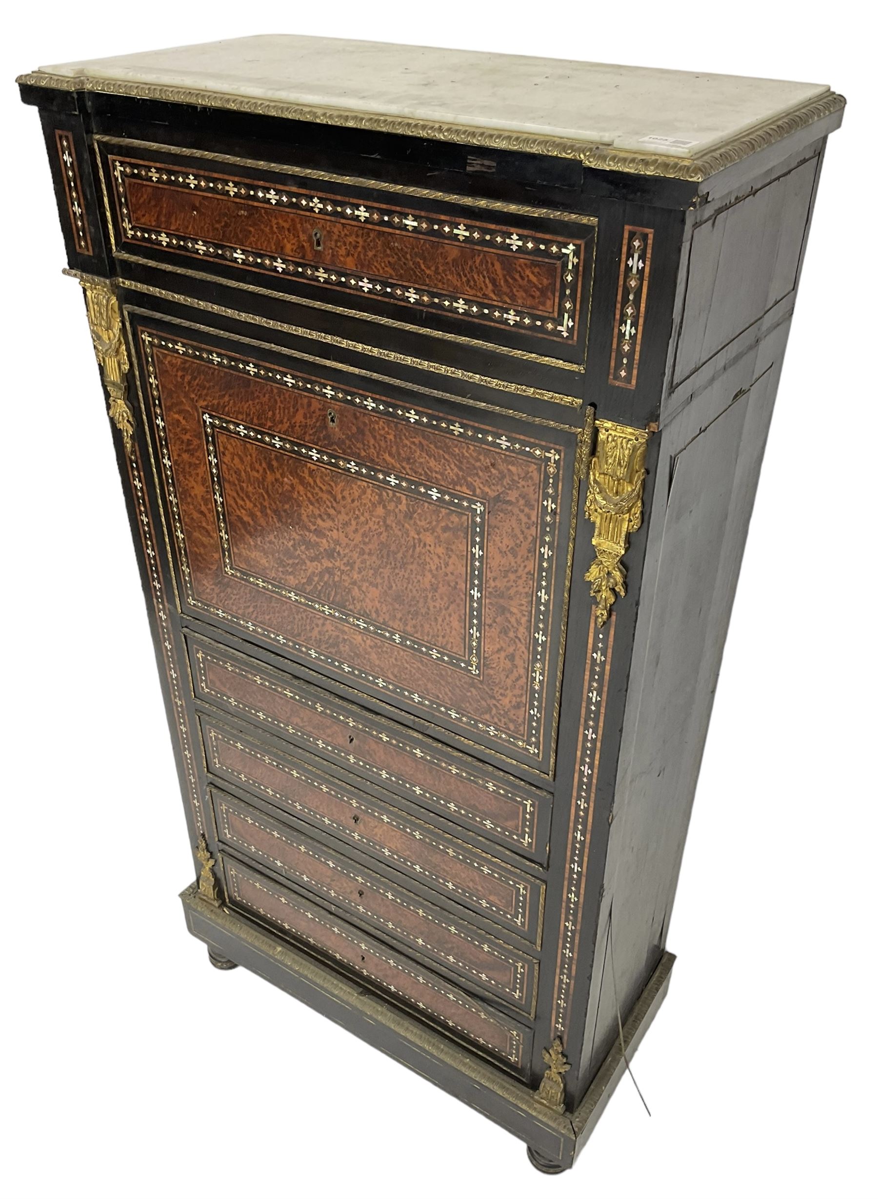 Late 19th century French ebonised and amboyna secrétaire à abattant, white marble top over frieze drawer, fall front and four further drawers, inlaid with trailing pattern in mother of pearl, mounted by cast gilt metal brackets with floral festoons, plinth base with foliate mounted edging and brass stringing, on turned feet 