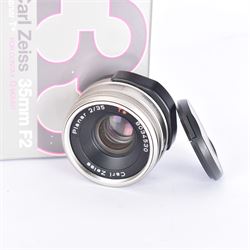 Carl Zeiss Planar 2/35 35mm T* lens, serial no. 8034530, for Contax G mount, boxed with warranty and two lens caps