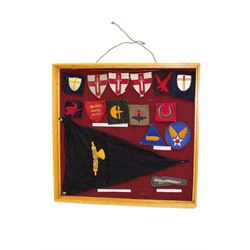 Fifteen WWII insignia cloth badges, including Channel Islands Liberation Force, 13th Infantry Division, British 78th infantry, 1st Army formation sign, USAAF WWII shoulder flashes, etc, all within a framed display H36cm,  W37cm   