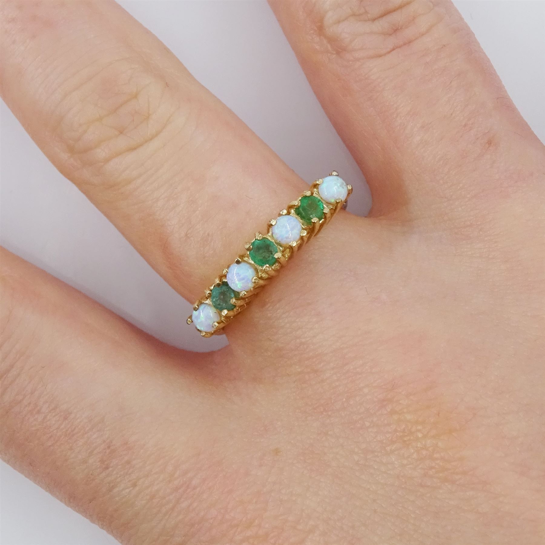 9ct gold seven stone opal and emerald ring, hallmarked