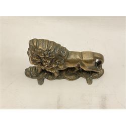 Brass door stop, modelled as a lion, H15cm