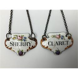 Two late 18th/early 19th century enamel wine labels, each of shaped form, titled 'CLARET', and 'SHERRY' and decorated with floral sprigs and scroll detail upon a white ground, each with suspension chain, each approximately H3.5cm W5cm