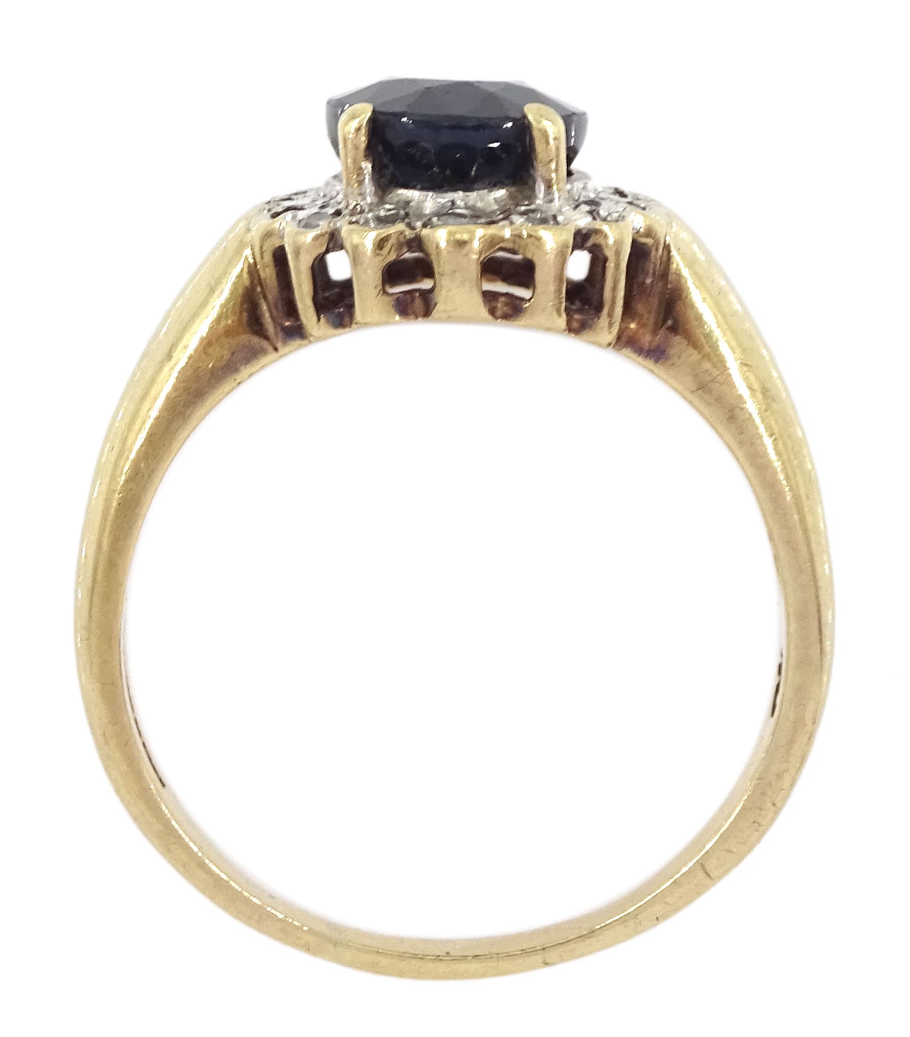 9ct gold oval cut sapphire and round brilliant cut diamond cluster ring, hallmarked