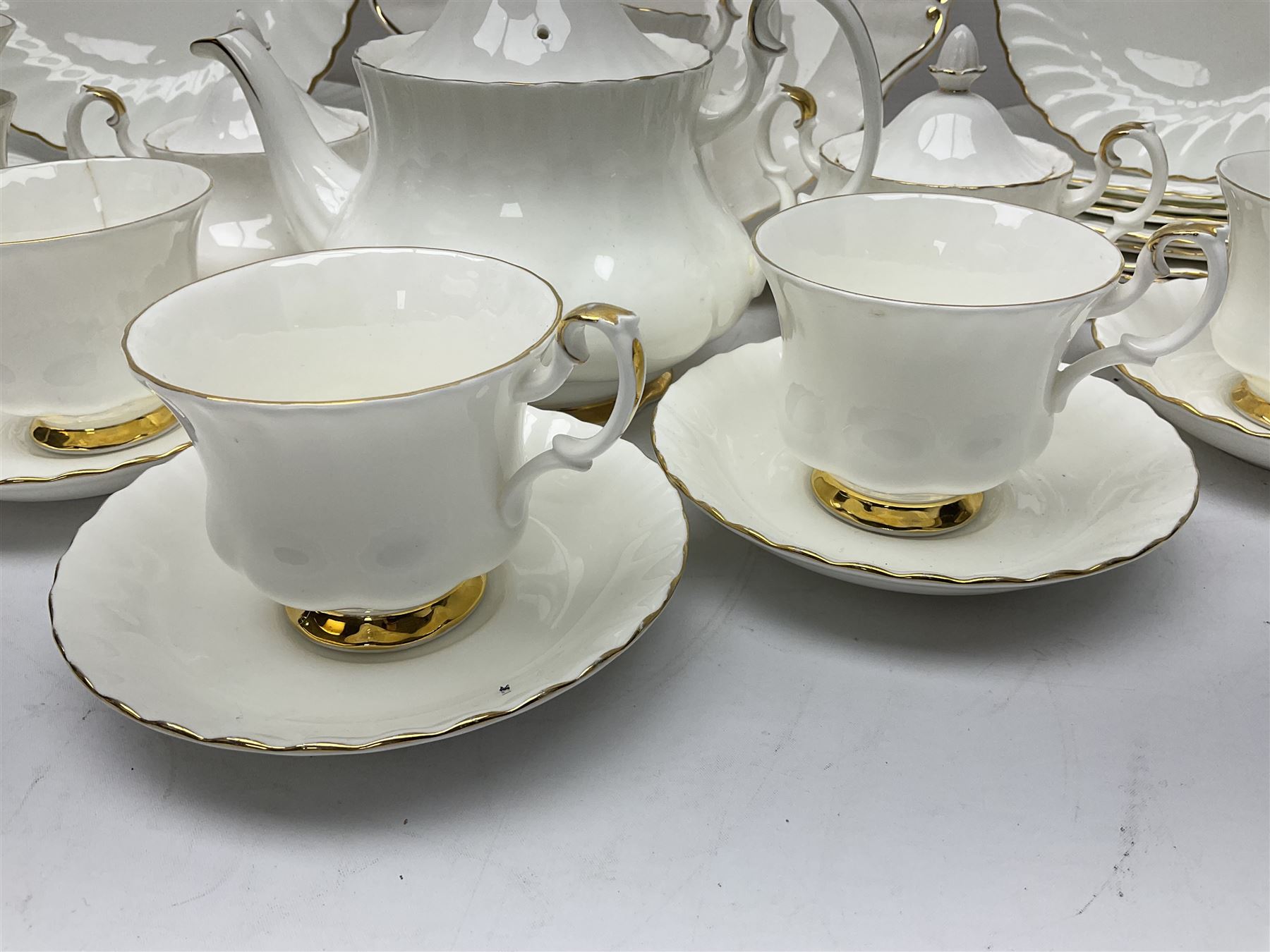 Royal Albert Val D'or pattern tea service for six, comprising teapot, milk jug, sucrier, six teacups and saucers, tea plates, side plates, dessert plates, etc (33)