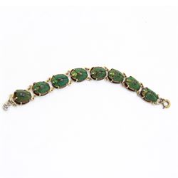 Scarab beetle bracelet, with eight scarab links mounted on a base metal chain, L15.5cm