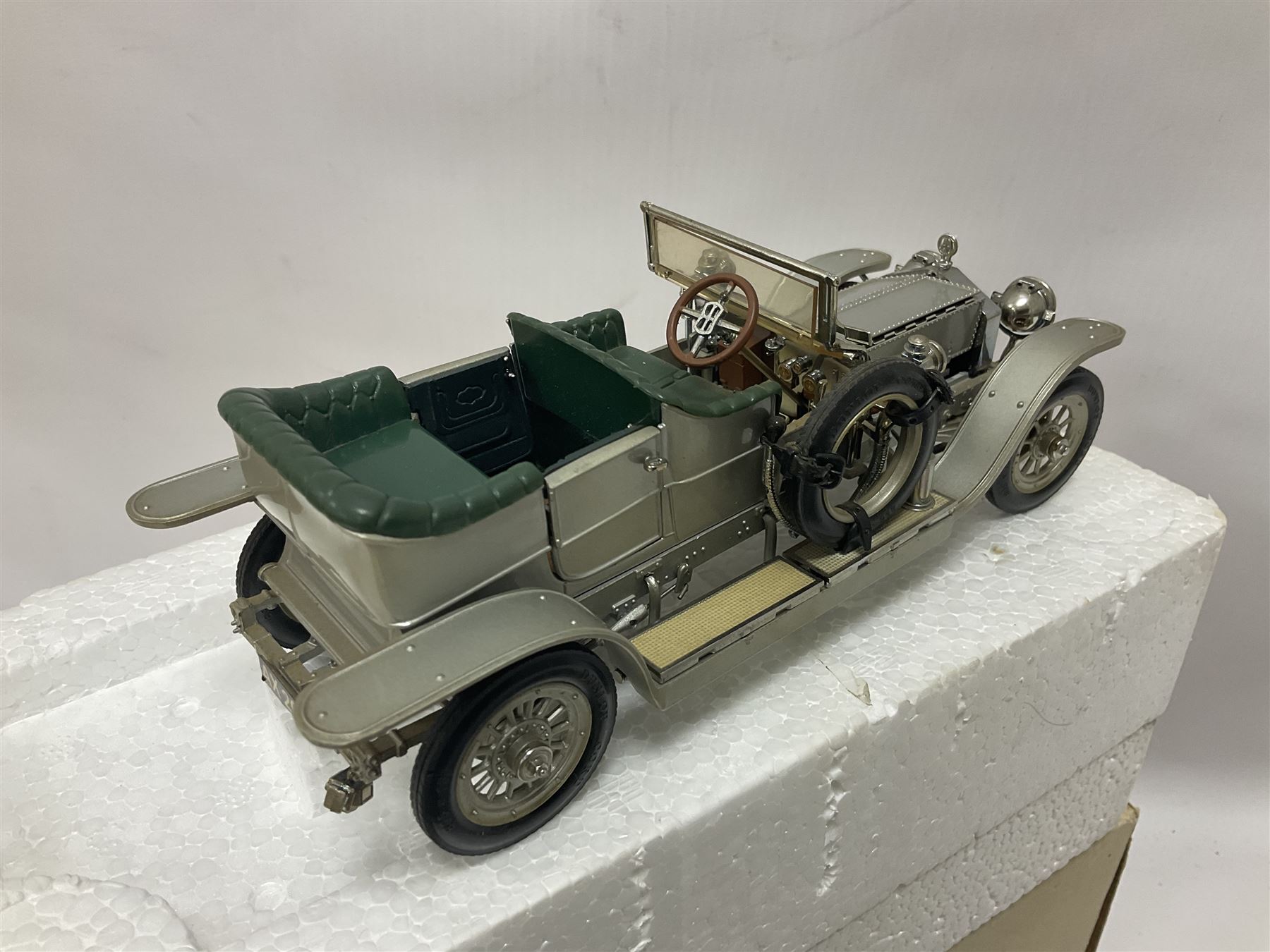 Franklin Mint - six 1:24 scale die-cast Rolls-Royce models comprising 1907 Rolls-Royce ‘The Silver Ghost’, boxed with original packaging and paperwork, 1929 Rolls-Royce ‘Phantom I’ with original packing, 1914 Rolls-Royce, 1911 Rolls-Royce, 1955 Rolls-Royce ‘Silver Cloud 1’, and 1992 Rolls-Royce Corniche IV 