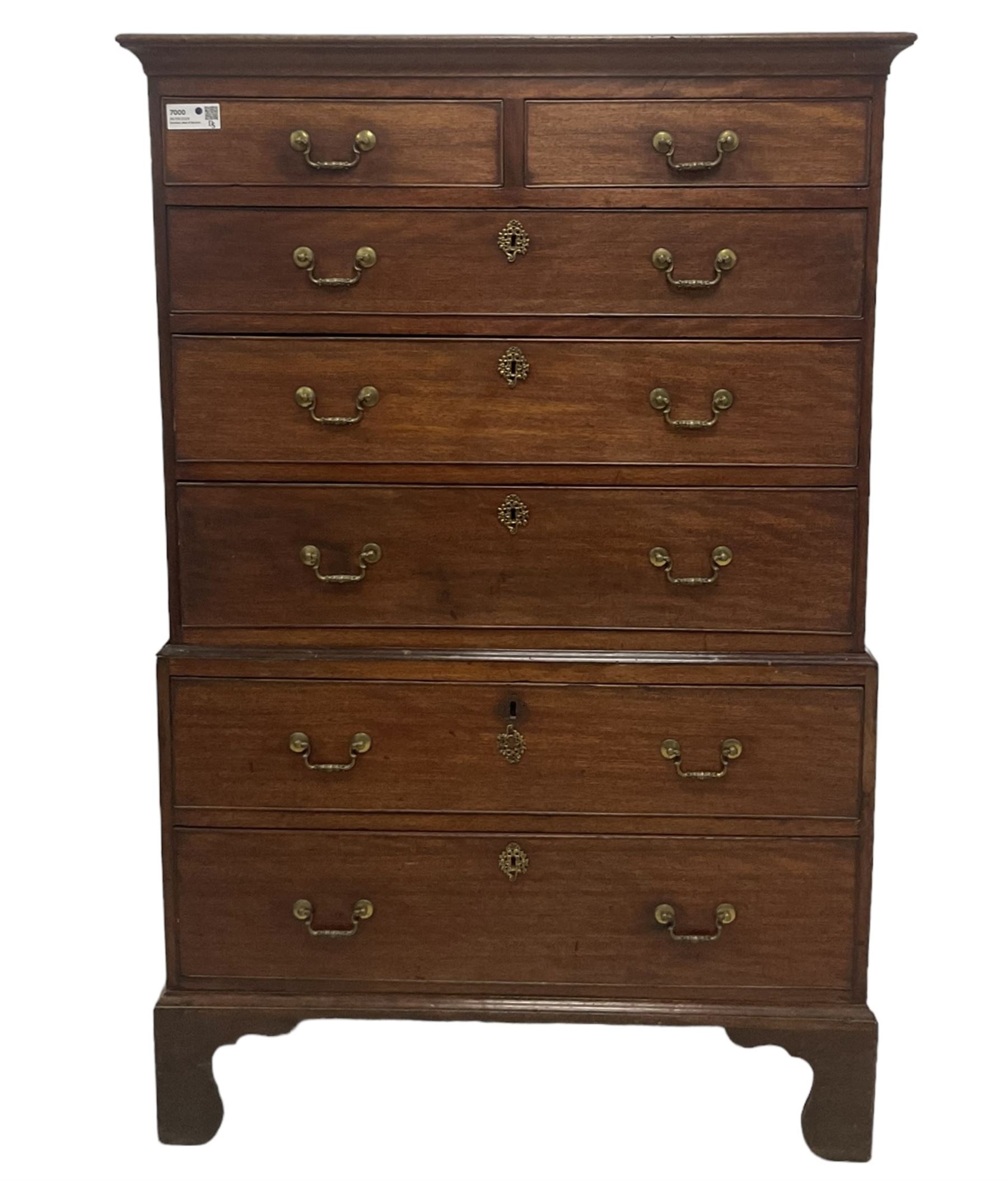 George III mahogany chest-on-chest, projecting cornice over two short and five long graduating cock-beaded drawers, each fitted with original brass swan neck handles, raised on bracket feet