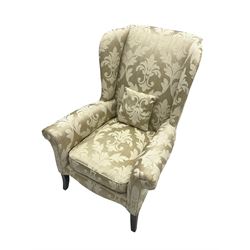 Parker Knoll - wingback armchair upholstered in champagne fabric with foliate pattern