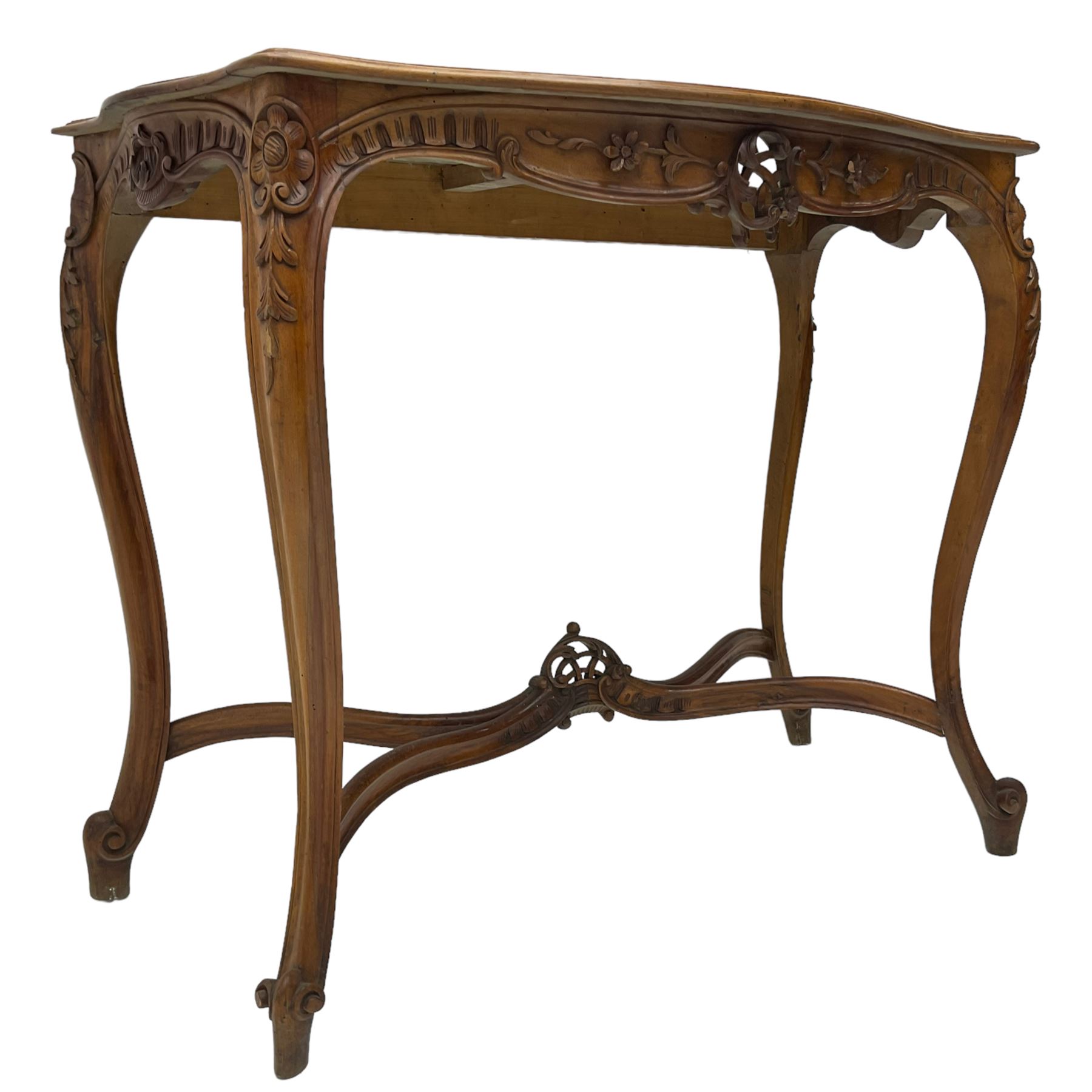 French design walnut console table, shaped top with inset grey marble panel, the frieze pierced and carved with scrolling foliage and applied flower heads, raised on cabriole supports with cartouche carved knees, united by shaped X-stretcher