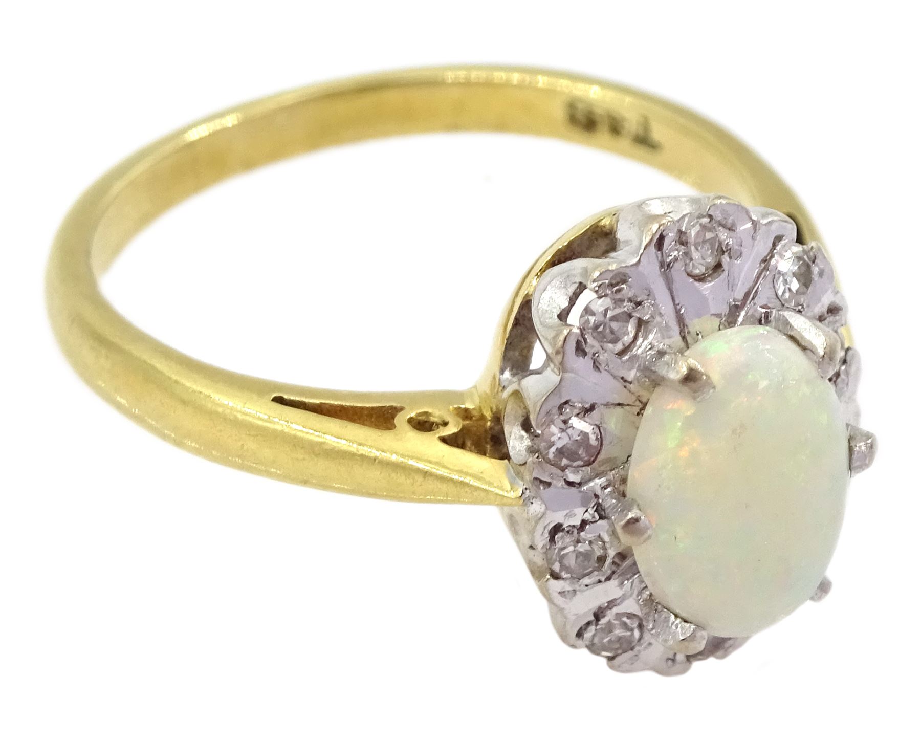 18ct gold opal and round brilliant cut diamond cluster ring, London 1975