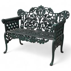 Victorian design cast iron bench, tailing oak leaf and branch pattern, rams head arm termi...