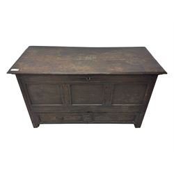 18th century oak mule chest, rectangular plank top with moulded edge, enclosing candle box with internal divisions, panelled front with applied moudlings, fitted with single drawer to the base with brass swing handle, on stile supports