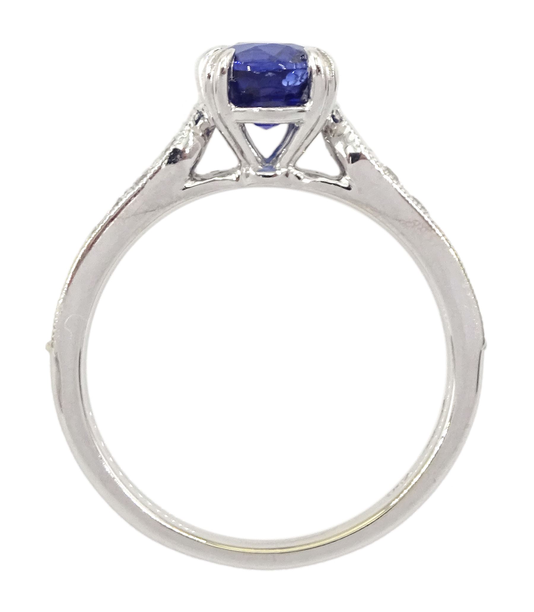 18ct white gold oval cut sapphire ring, with milgrain set round brilliant cut diamond shoulders, hallmarked, sapphire approx 0.80 carat, total diamond weight approx 0.40 carat