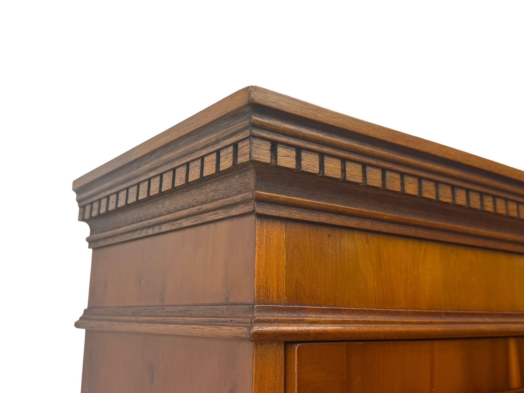 Mid-to-late 20th century yew wood bureau bookcase, raised bookcase enclosed by glazed door, the fall front revealing fitted interior, four graduating cock-beaded drawers below, on bracket feet