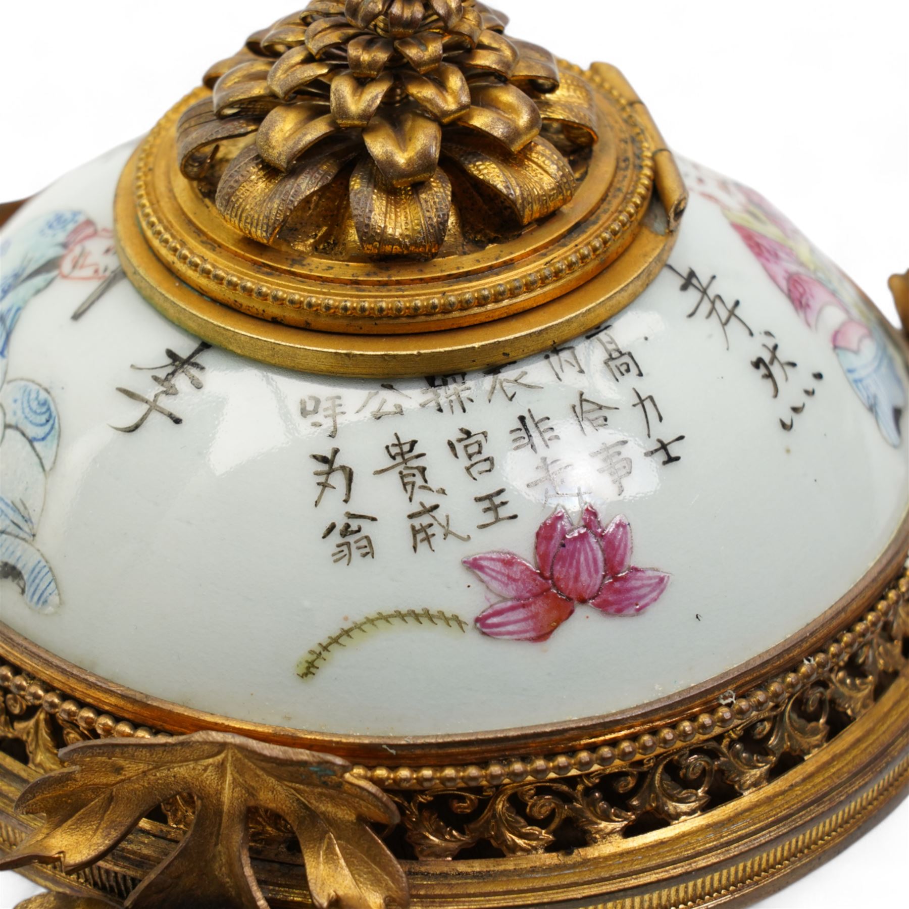 19th century Chinese porcelain famille rose inkwell, painted with figures from the Wu Shuang Pu to include Jiao Xiao Ran and Li Bai, mounted with ormolu style gilt metal mounts, including a floral hinged cover, pierced gallery base, on three rose stem supports, L13cm x H9cm