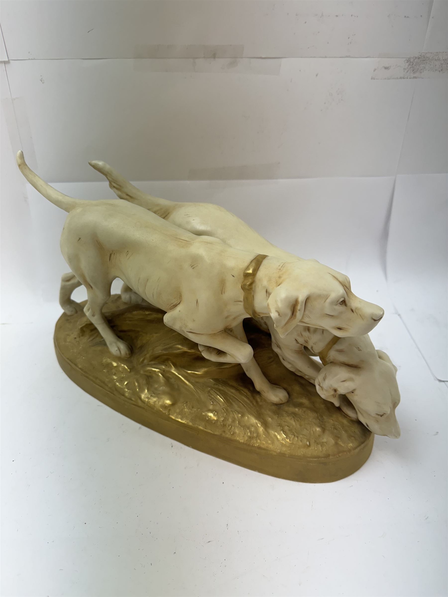 Royal Dux porcelain figure group, depicting two hunting dogs, with pink triangle mark beneath, H19cm