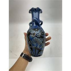 Alexander Lauder for Barum Pottery, vase of baluster form with fluted time, decorated in relief with fish upon a blue ground, H20cm