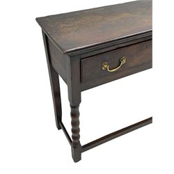 18th century oak dresser base, rectangular top, fitted with two drawers with moulded facia edges and brass swan neck handles, raised on turned front supports united by stretchers