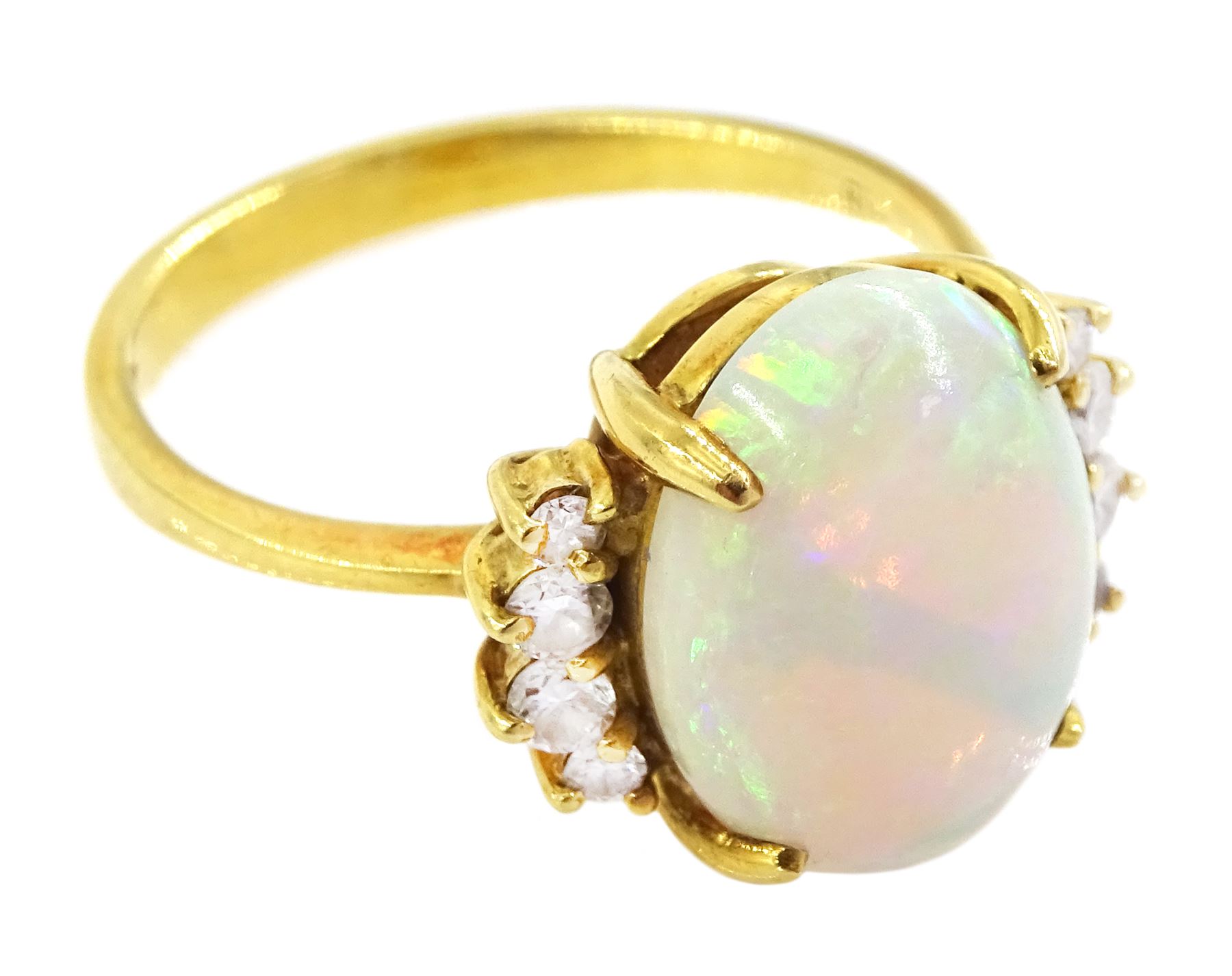 18ct gold single stone opal ring, with four round brilliant cut diamonds set either side, old opal ring, with four diamonds set either side