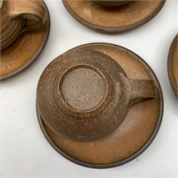 Glynn Hugo (b.1934), a studio pottery teaset, comprising tea pot, milk jug, six teacups, and six saucers. 