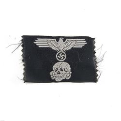 Third Reich SS M43 one piece Trapezoid field cap insignia, machine-woven SS Eagle above th...