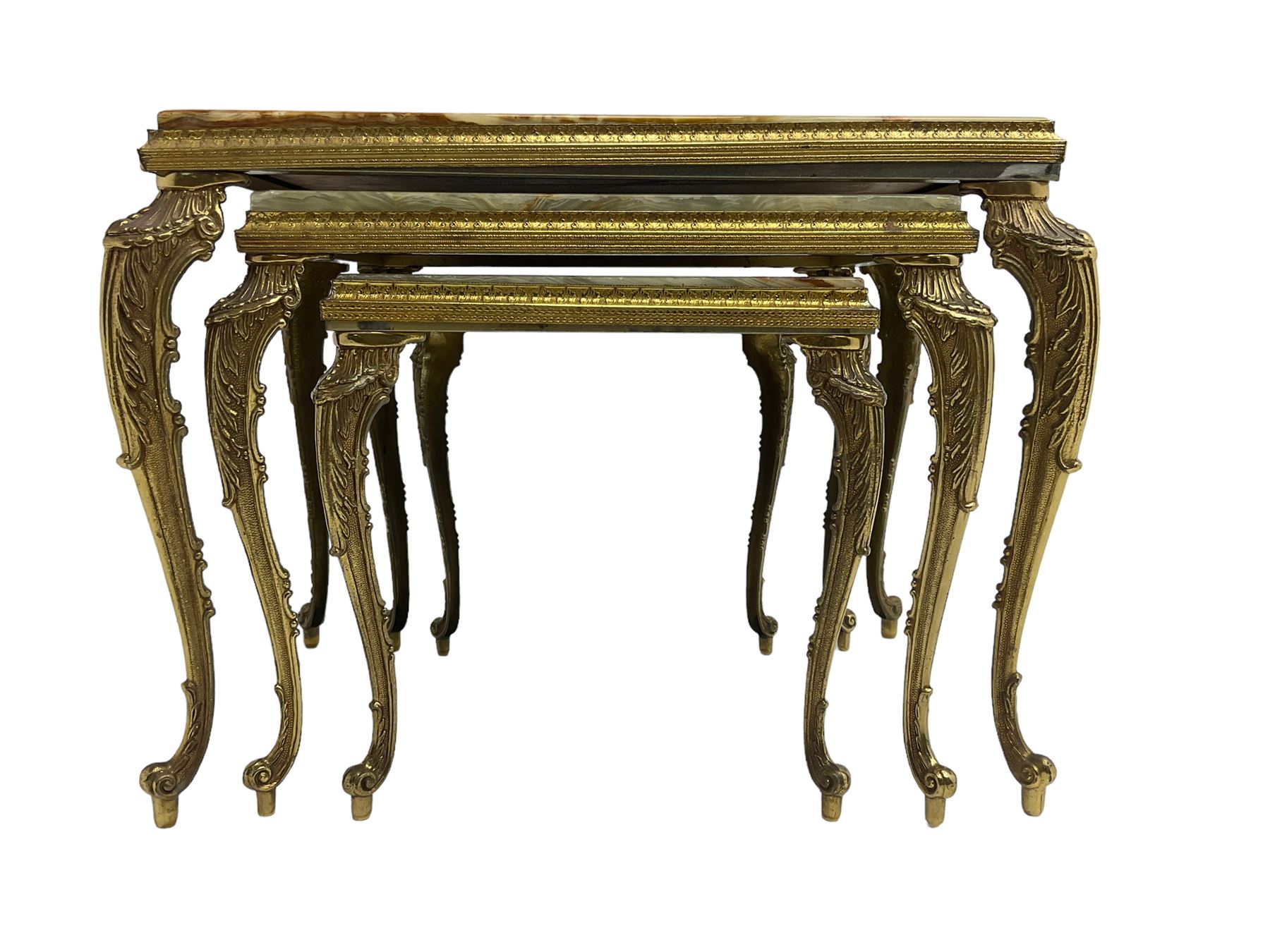 Mid-20th century Italian design onyx and gilt metal nest of three tables, rectangular tops raised on foliate decorated cabriole supports