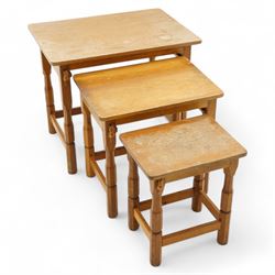 Beaverman - oak nest of three occasional tables, rectangular top over octagonal supports u...