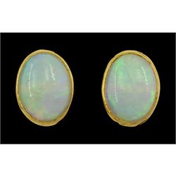 Pair of 18ct gold opal stud earrings, hallmarked