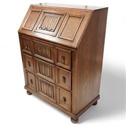 Mid-20th century oak bureau, fitted with fall front above three drawers