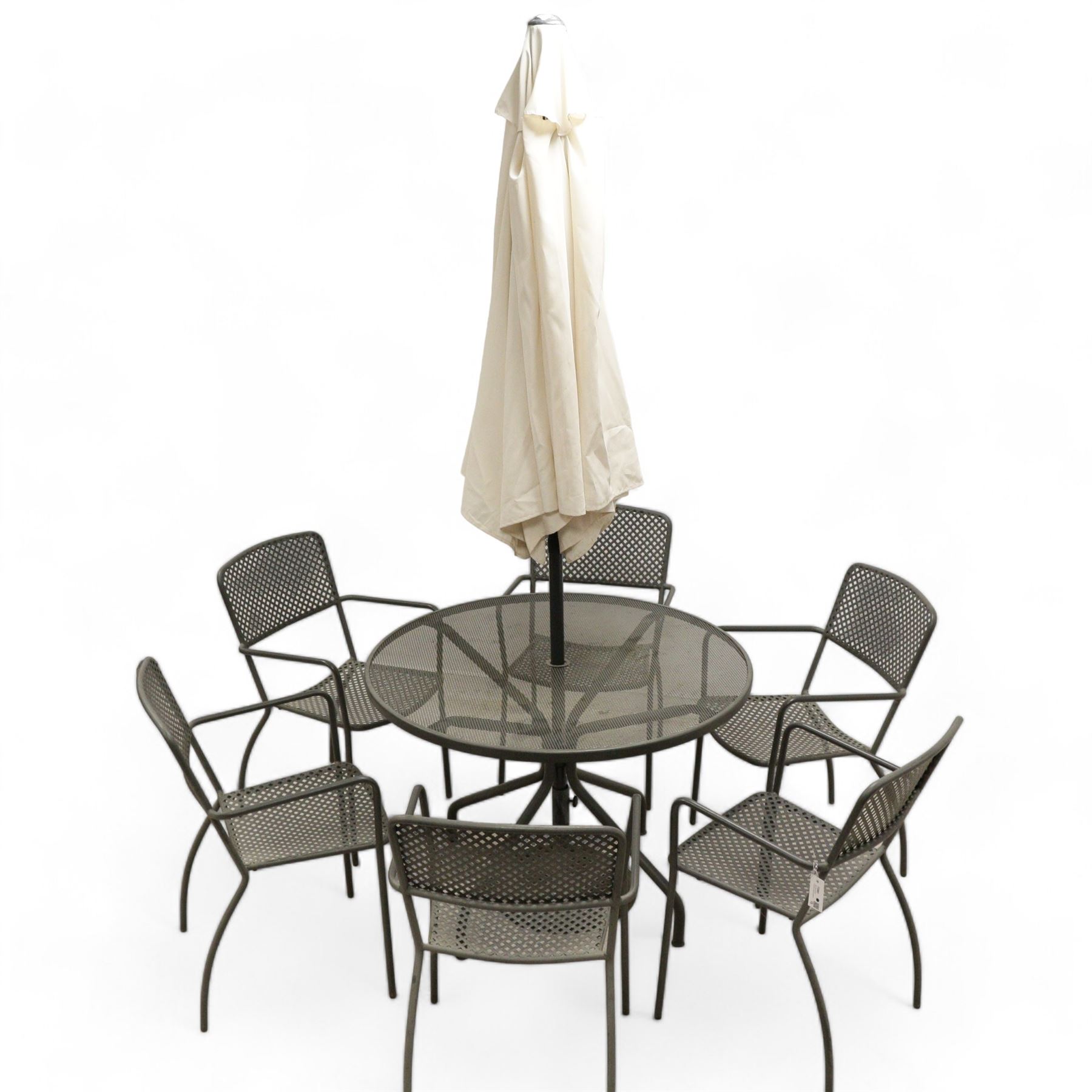 Wrought metal circular garden table, and six lattice back chairs