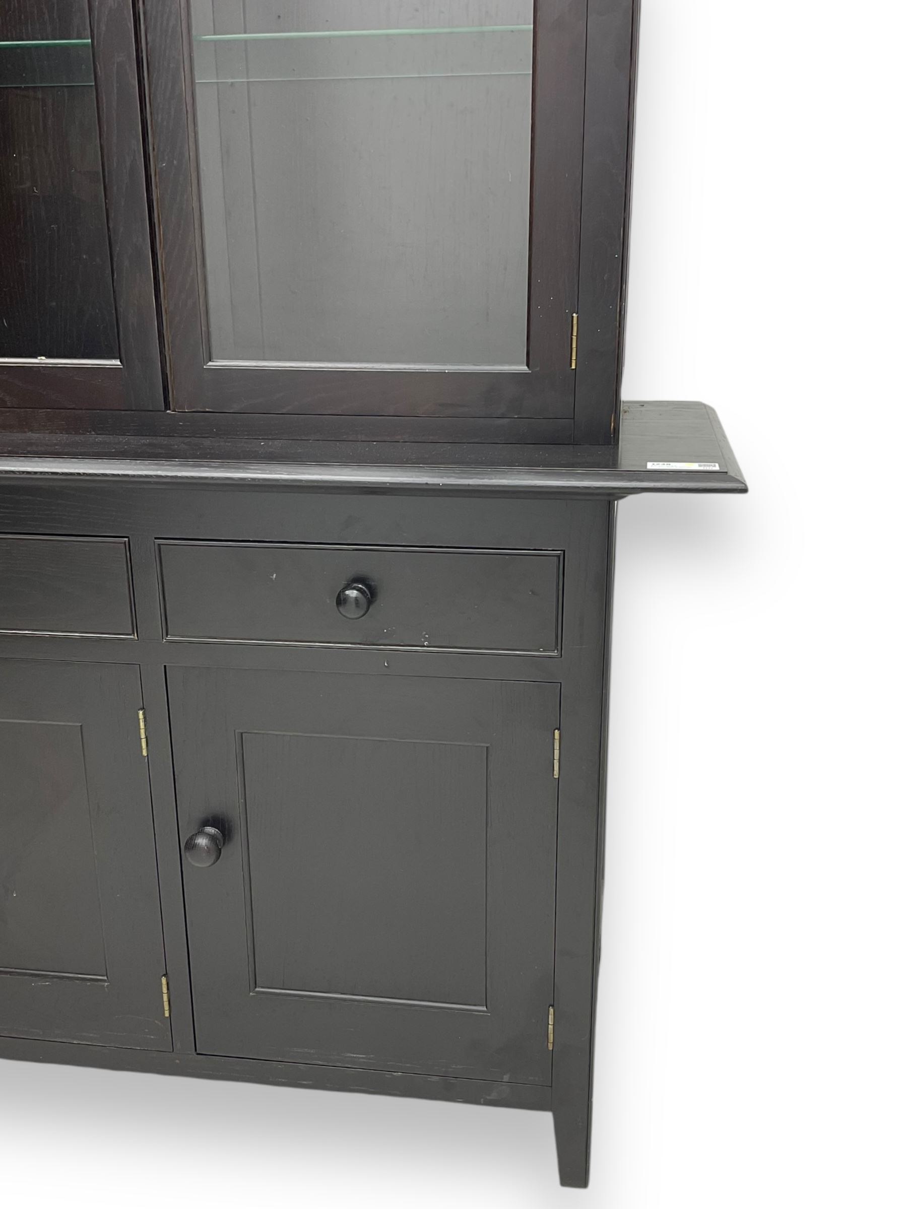 Marks and Spencer - black finish display unit, three glazed cupboards above three drawers and three further cupboards