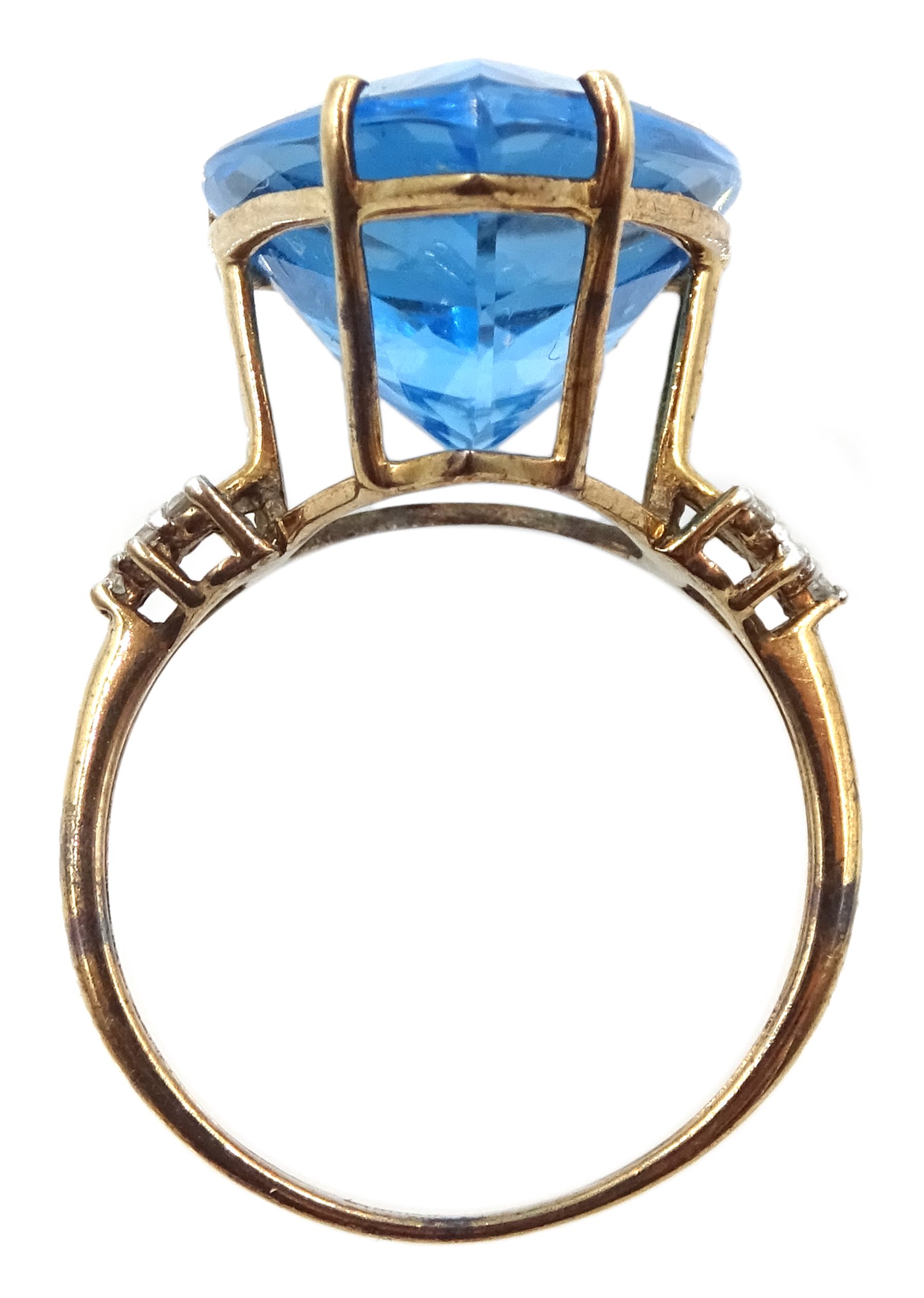 9ct gold pear shaped blue topaz ring, with diamond set shoulders, hallmarked