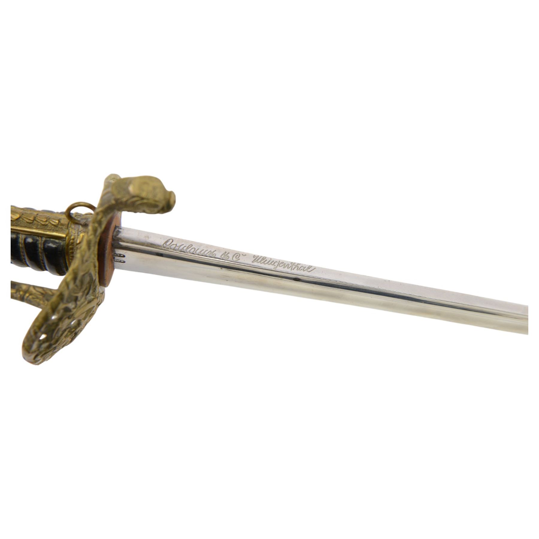 Reproduction 1870s French naval officers sword, with slightly curved single edge blade, brass hilt with dolphin quillon and anchor amidst a pierced floral hilt, wire bound grip, in brass mounted leather scabbard, overall L84cm