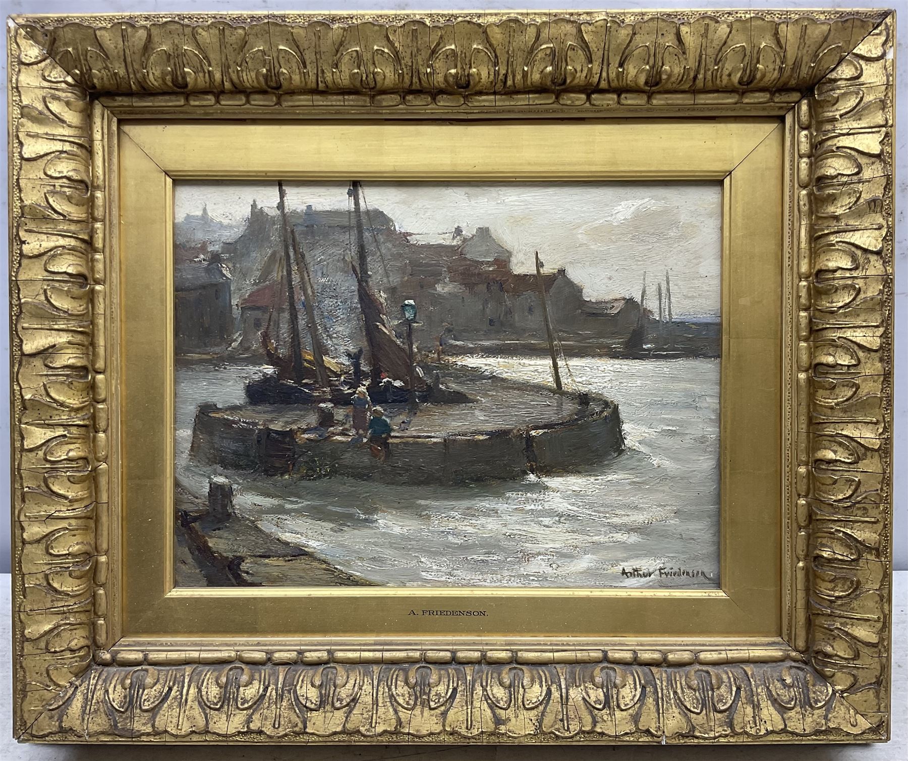 Arthur A Friedenson (Staithes Group 1872-1955): Children Fishing 'Pittenweem Harbour Fifeshire', oil on panel signed, titled and signed verso 25cm x 34cm