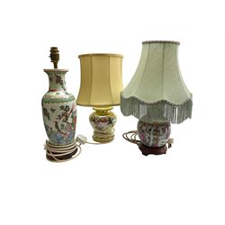 Oriental table lamp of slight baluster form decorated with birds, butterflies, peonies and prunus blossom, together with a further Oriental table lamp of squat ovoid form with fabric shade, and a Maling Rosland pattern table lamp with fabric shade, plus two further fabric shades, in one box