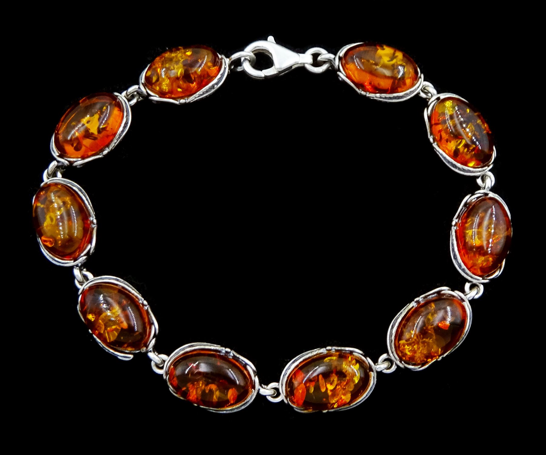 Silver Baltic amber oval link bracelet, stamped 925