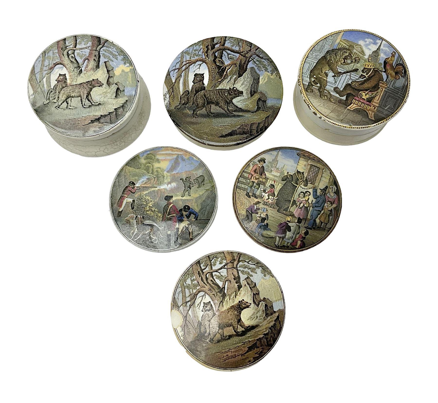 Six 19th century Prattware pot lids comprising 'The Village Wakes', three 'Bear on Rock', 'Shooting Bears' and 'Bear, Lion and Cock', two with associated bases, largest D9cm (6)