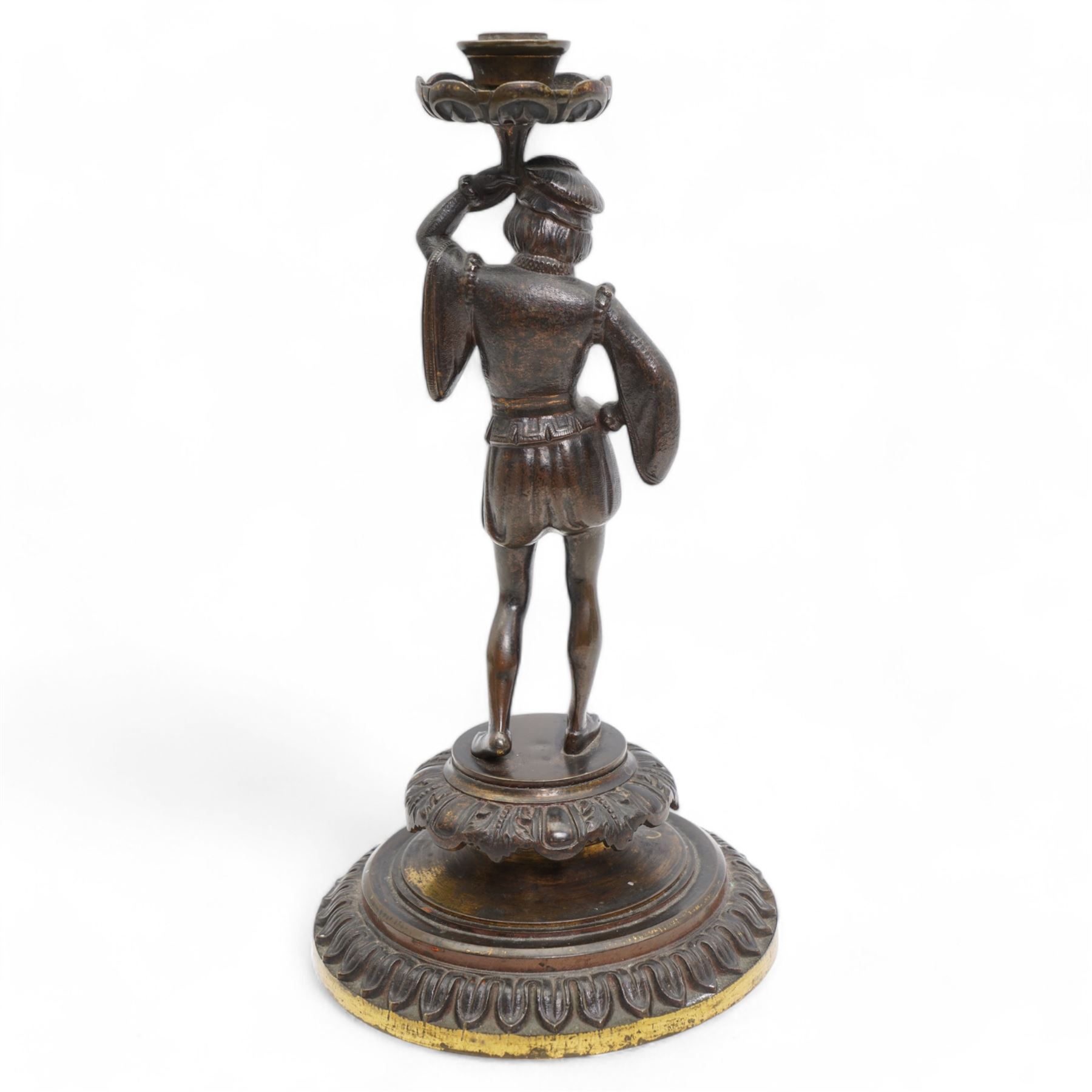 19th century continental bronze candle holder, the column formed as a courtier in Italian dress supporting the sconce, H31cm 