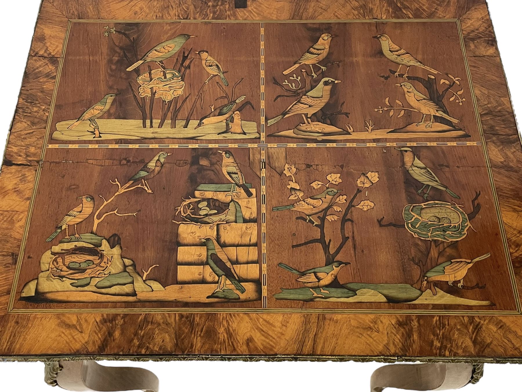 In the manner of Émile Gallé - late 19th to early 20th century inlaid walnut side table, rectangular top inlaid with Japonisme decoration depicting birds within trees, figured crossbanding and cast gilt foliate applied edge, single frieze drawer inlaid with scrolling brass work, on cabriole supports with ornate floral mounts